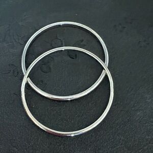 MONET VINTAGE PAIR OF PLAIN SILVER-TONE SIZE 7.7 BANGLE BRACELETS